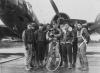 A bomber crew of the 390th Bomb Group with their B-17 Flying Fortress ( serial number 42-31027) nicknamed 